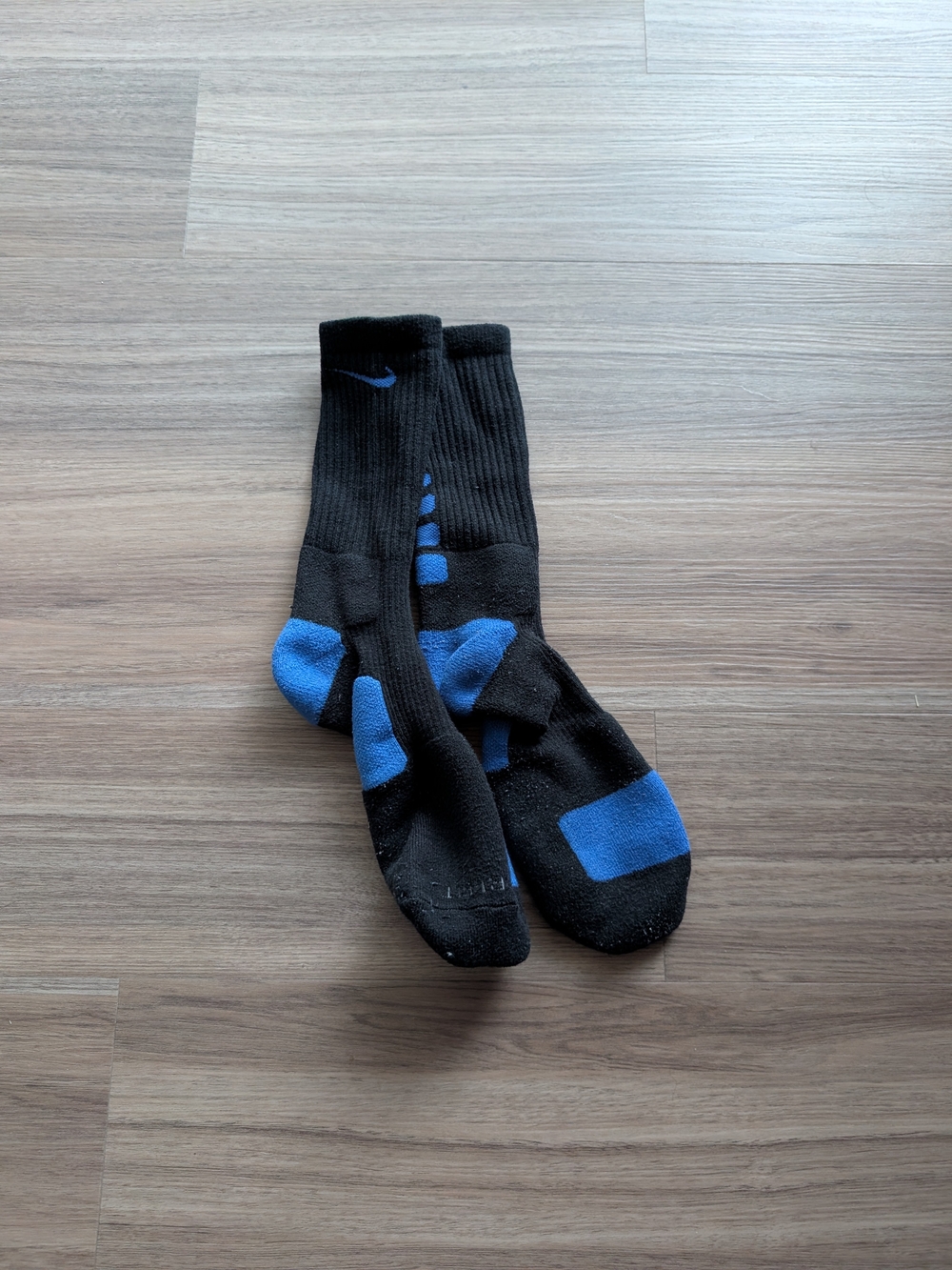 Nike Men's Black Crew Socks with Blue Cushioning Accents